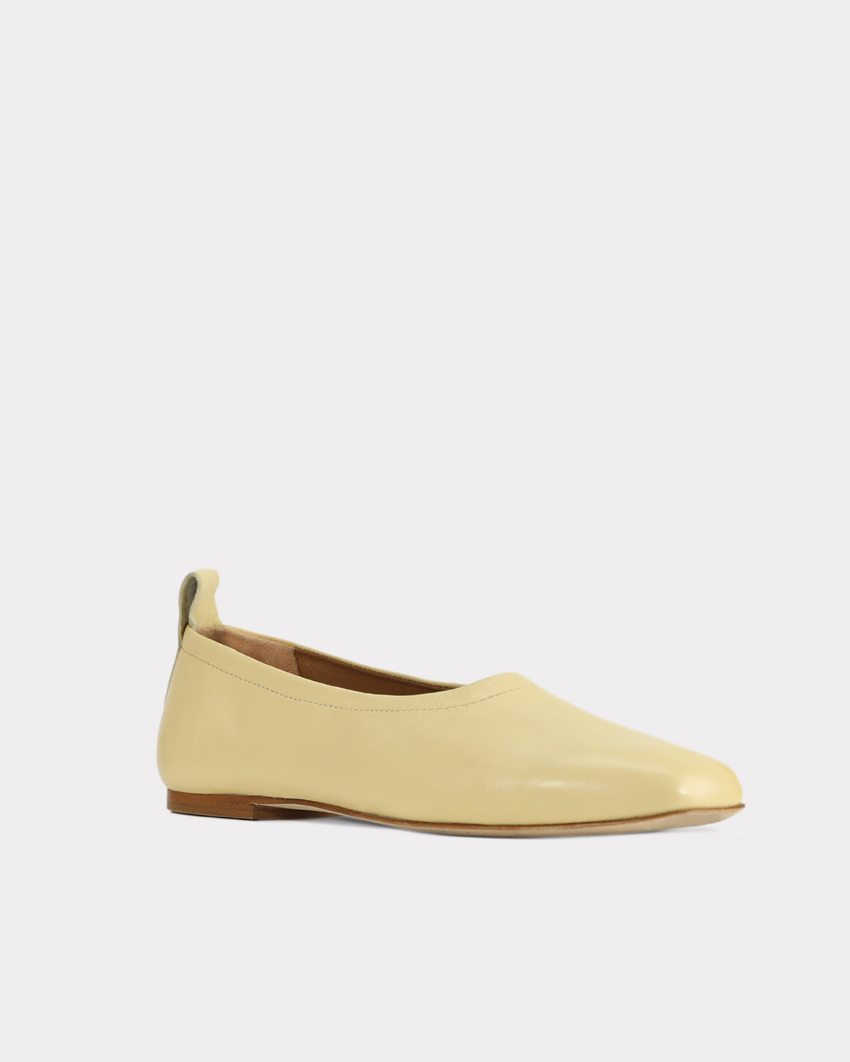 ethically sourced leather flats in pastel yellow