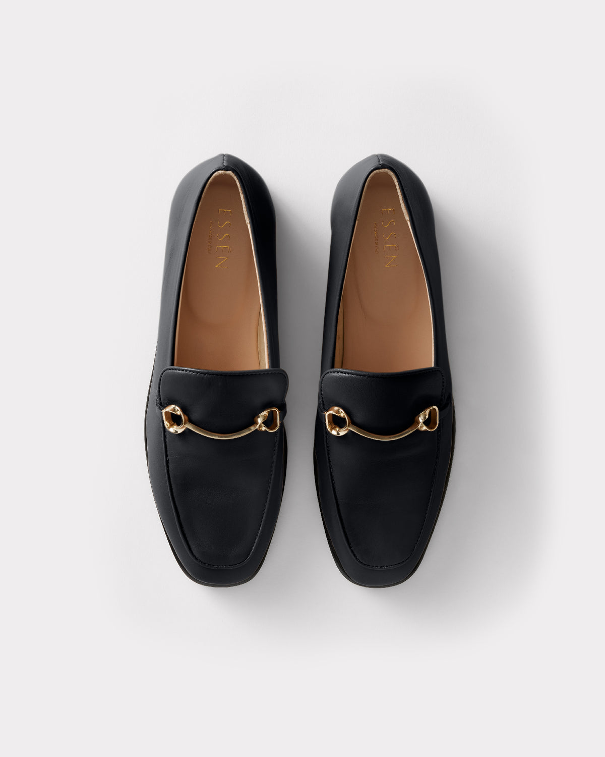 black leather loafer with recycled brass details
