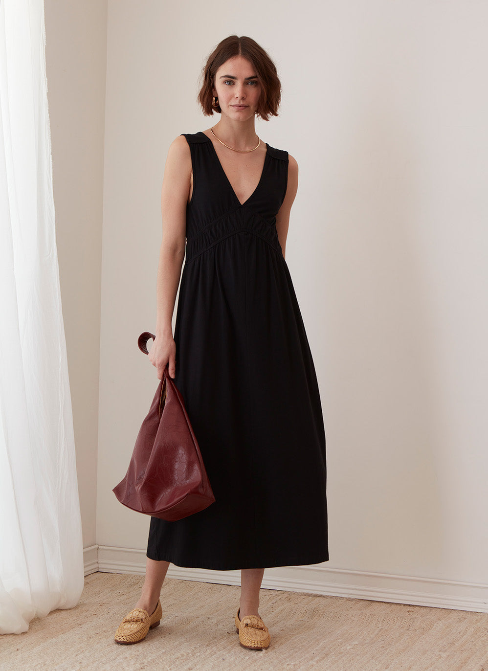 A line silhouette black midi dress