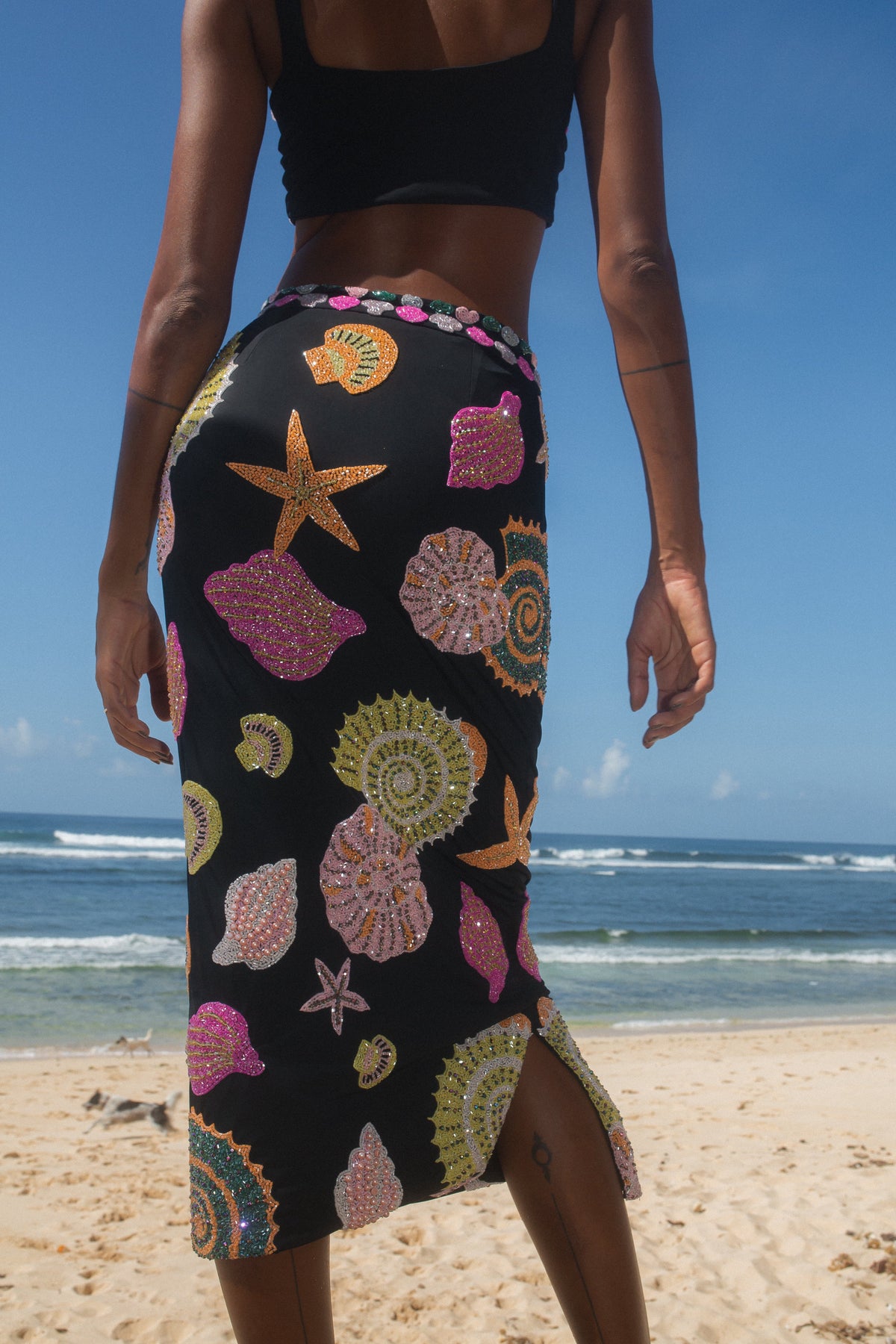 black skirt with sea motif prints with crystal embellishments