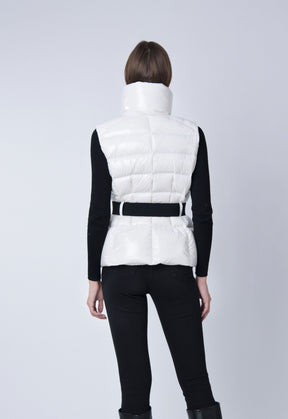 white puffer vest with black belt 