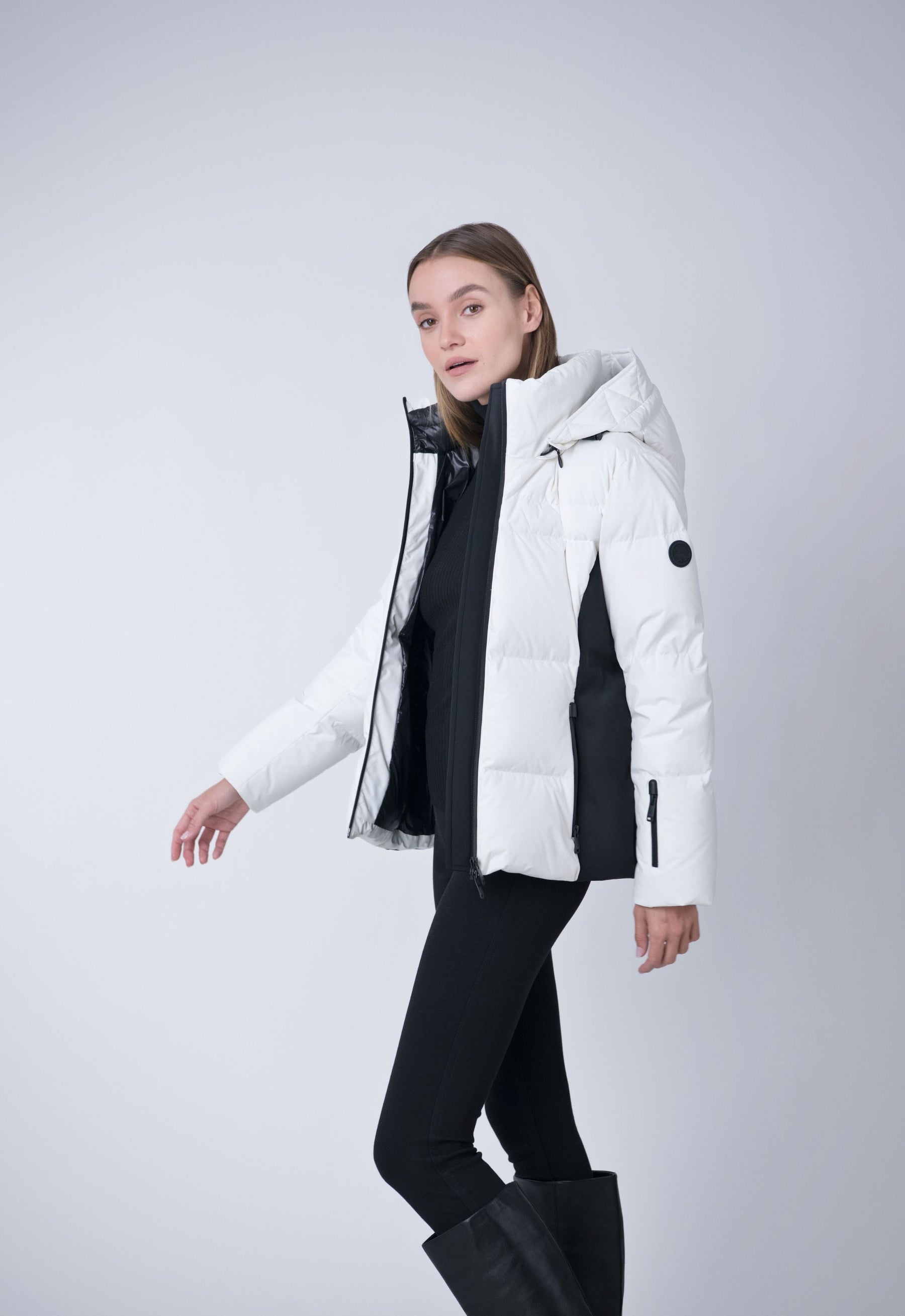 belted puffer coat made from recycled materials in white and black