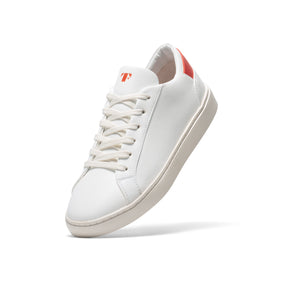 ethically made sneakers in white with red details