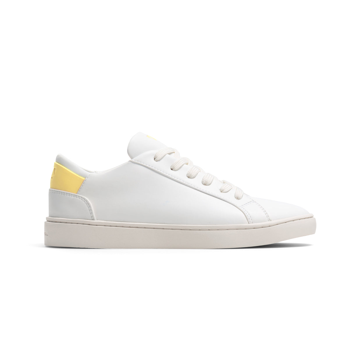 white sustainable sneaker with yellow rubber back heel