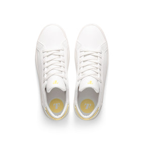 top view of eco friendly sneakers with yellow details