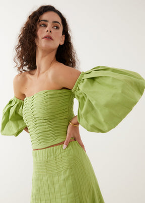green linen summer matching set with maxi skirt and off the shoulder top
