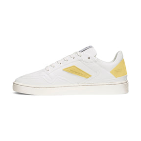 Side view of white sustainable vegan tennis shoe with pastel yellow details 