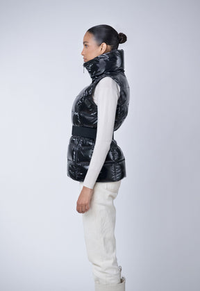 sustainable shiny belted puffer vest made from recycled materials in black