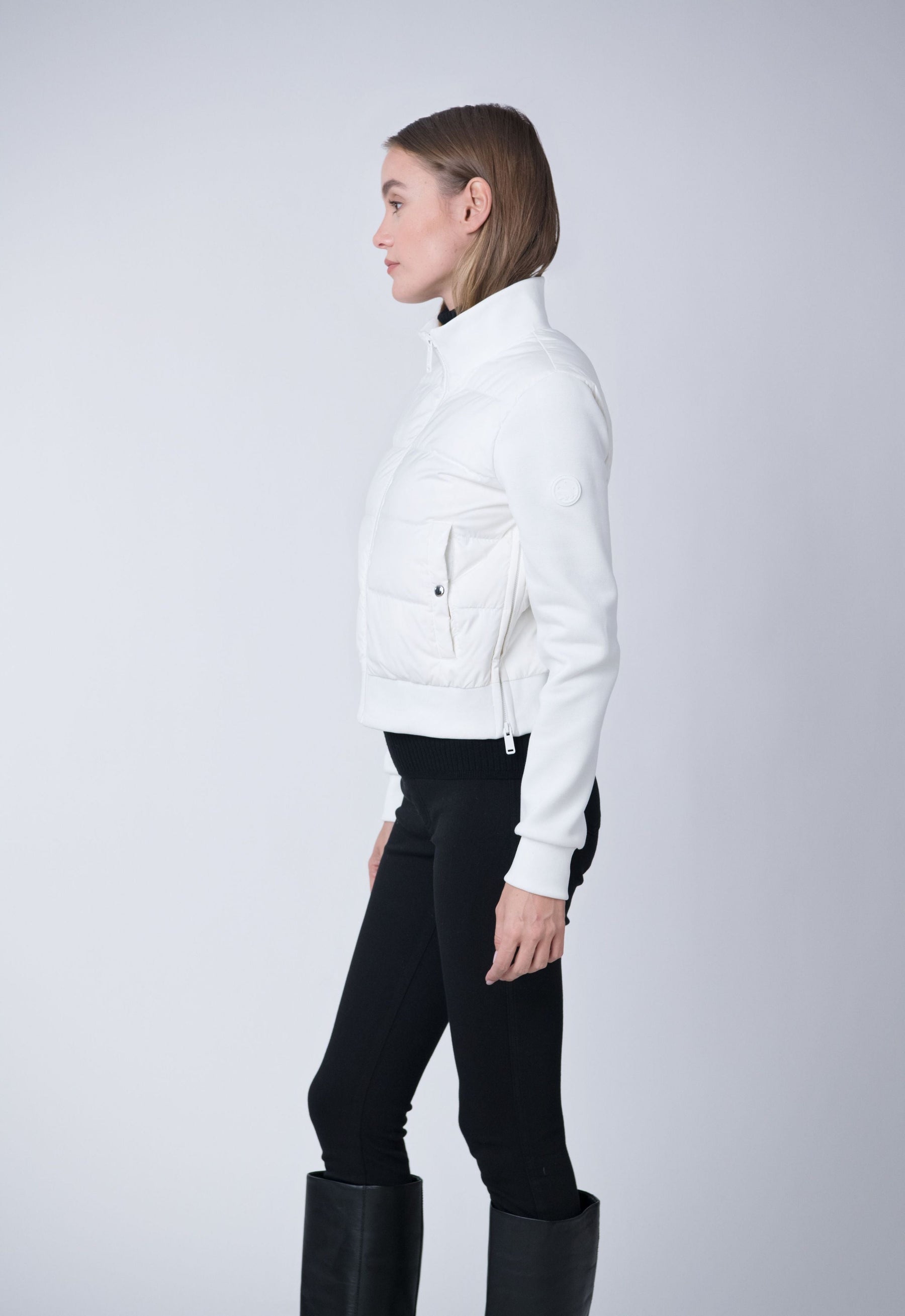 white puffer vest jacket with knit sleeves