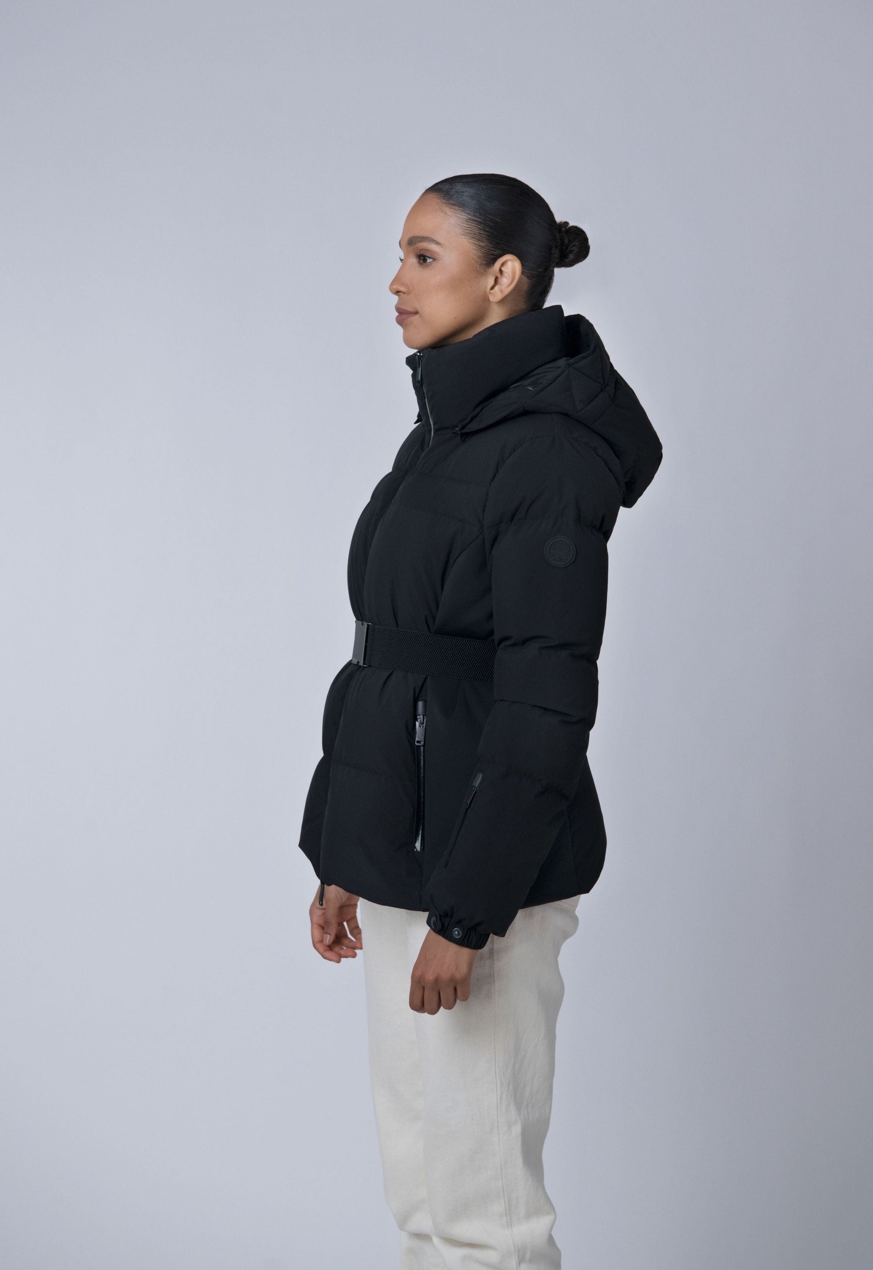 black fitted puffer coat made from recycled materials