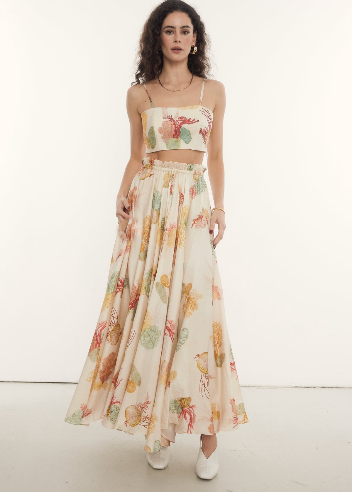 ocean printed sleeveless crop top with matching flowy maxi skirt