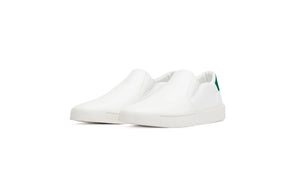 white sustainable slip on sneakers with dark green upper back heel
