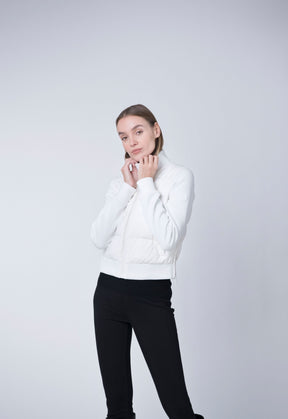 cropped white puffer jacket with knit sleeves