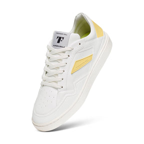 white eco-friendly sneaker with yellow details 