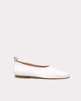 ethically sourced leather flats in white