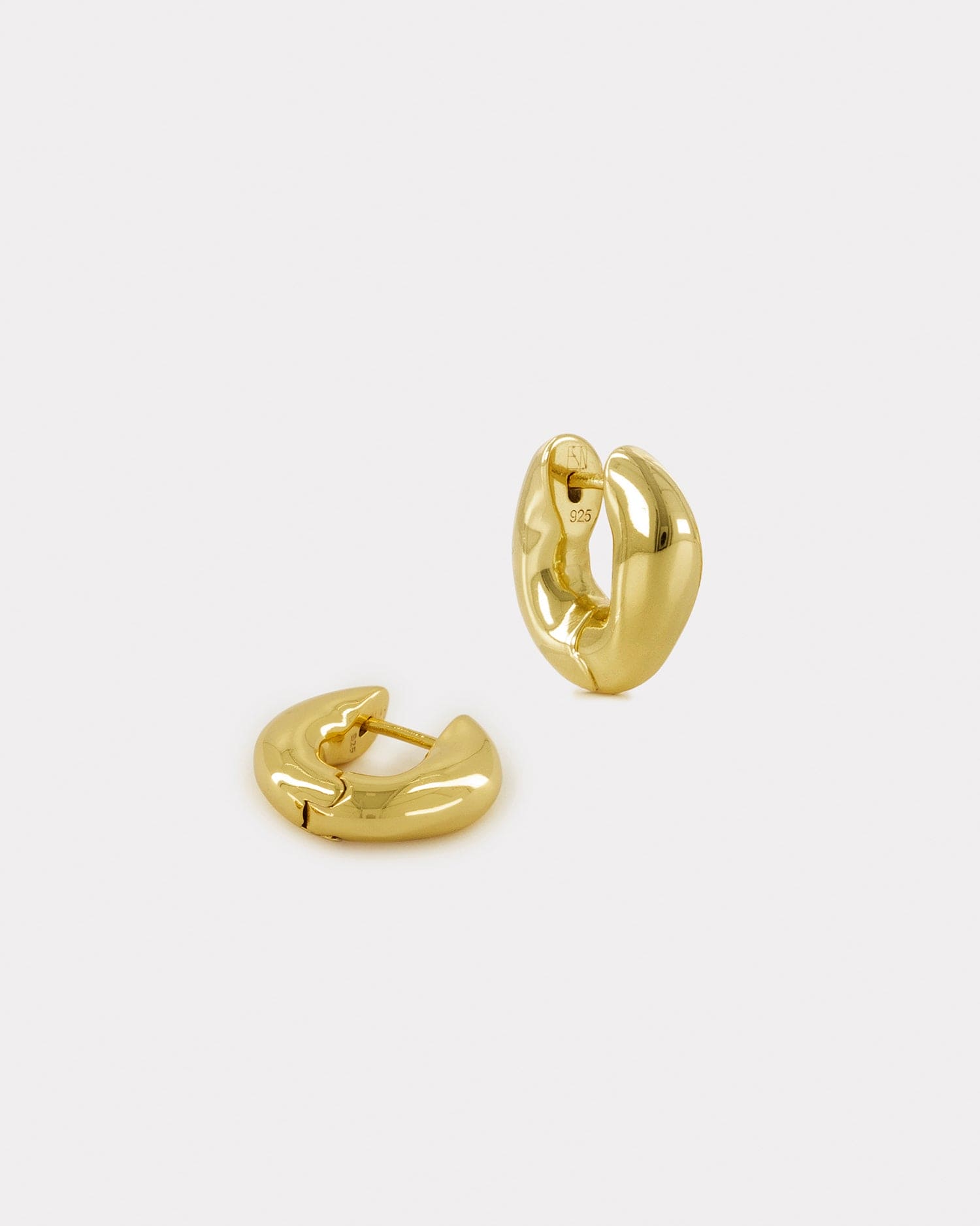 slow fashion gold huggie earrings