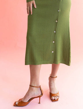 green knit dress for spring with buttons