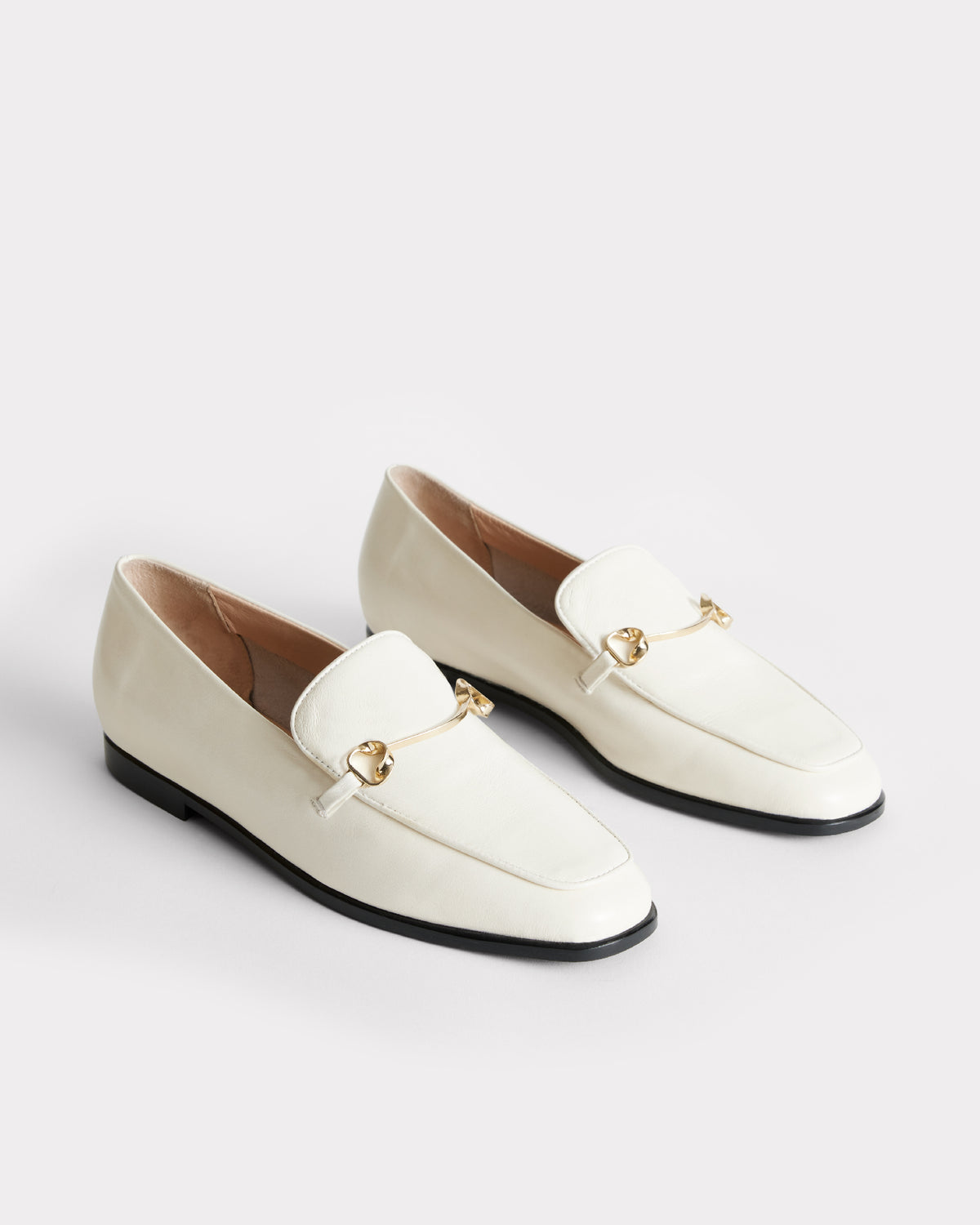 classic white leather moccasin with gold hardware