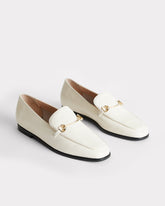 classic white leather moccasin with gold hardware