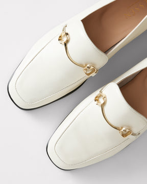 ethical leather loafer in white with gold hardware
