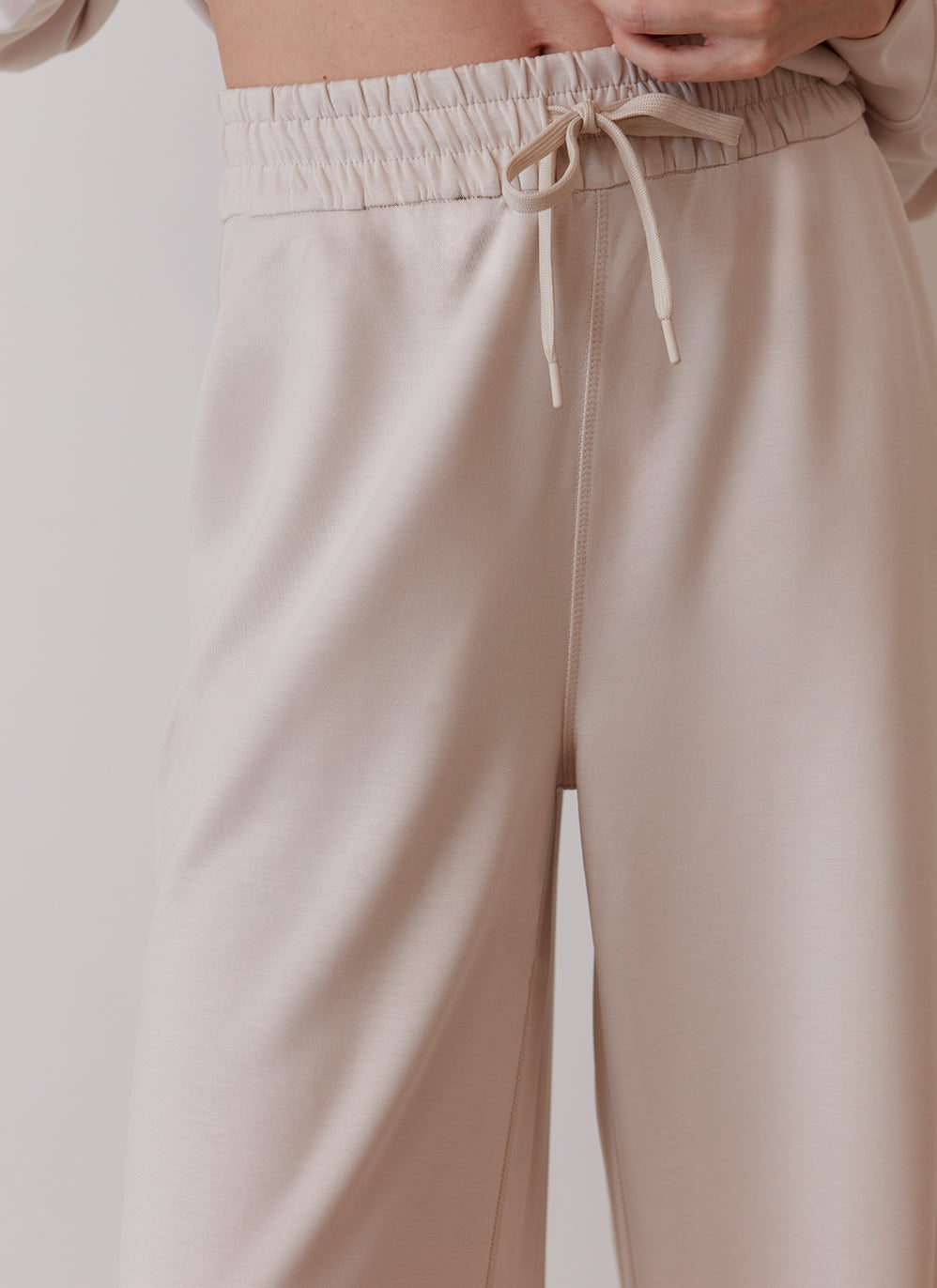 elastic waist with tie on cream wide leg sweatpants