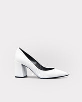 white leather pumps with pointed toe and block heel