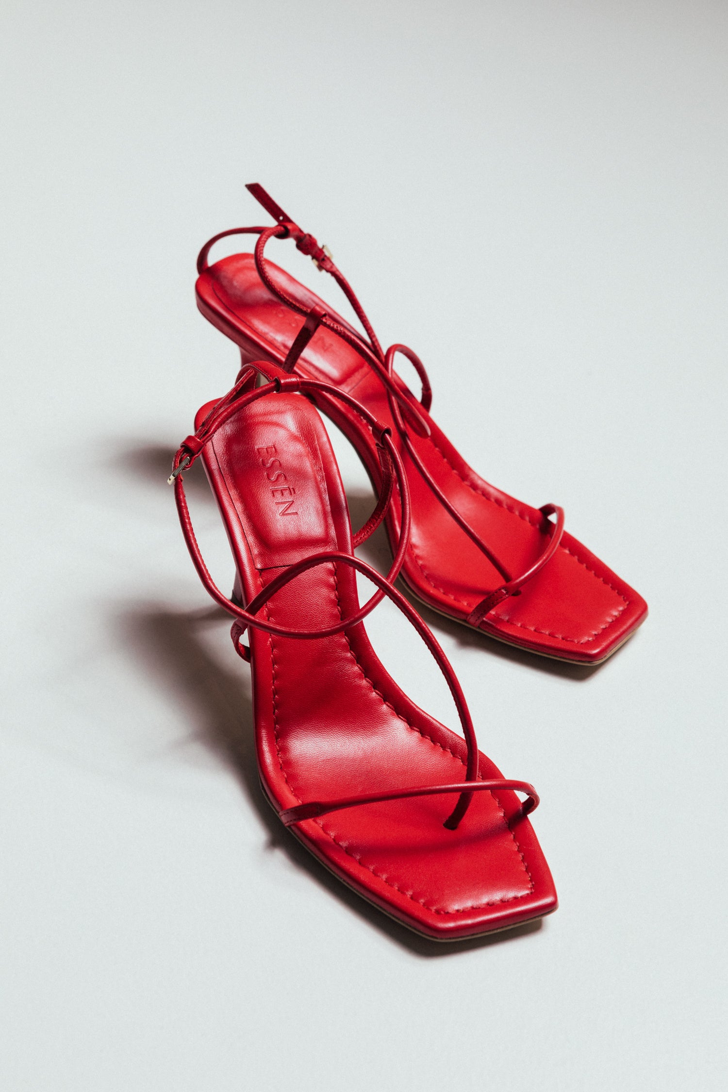 quiet luxury strappy leather sandals in red