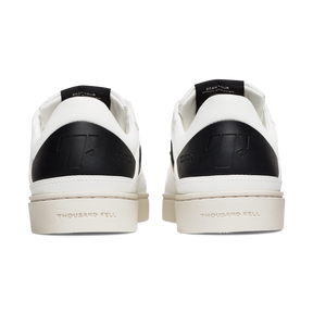 back view of vegan zero waste sneakers in black and white