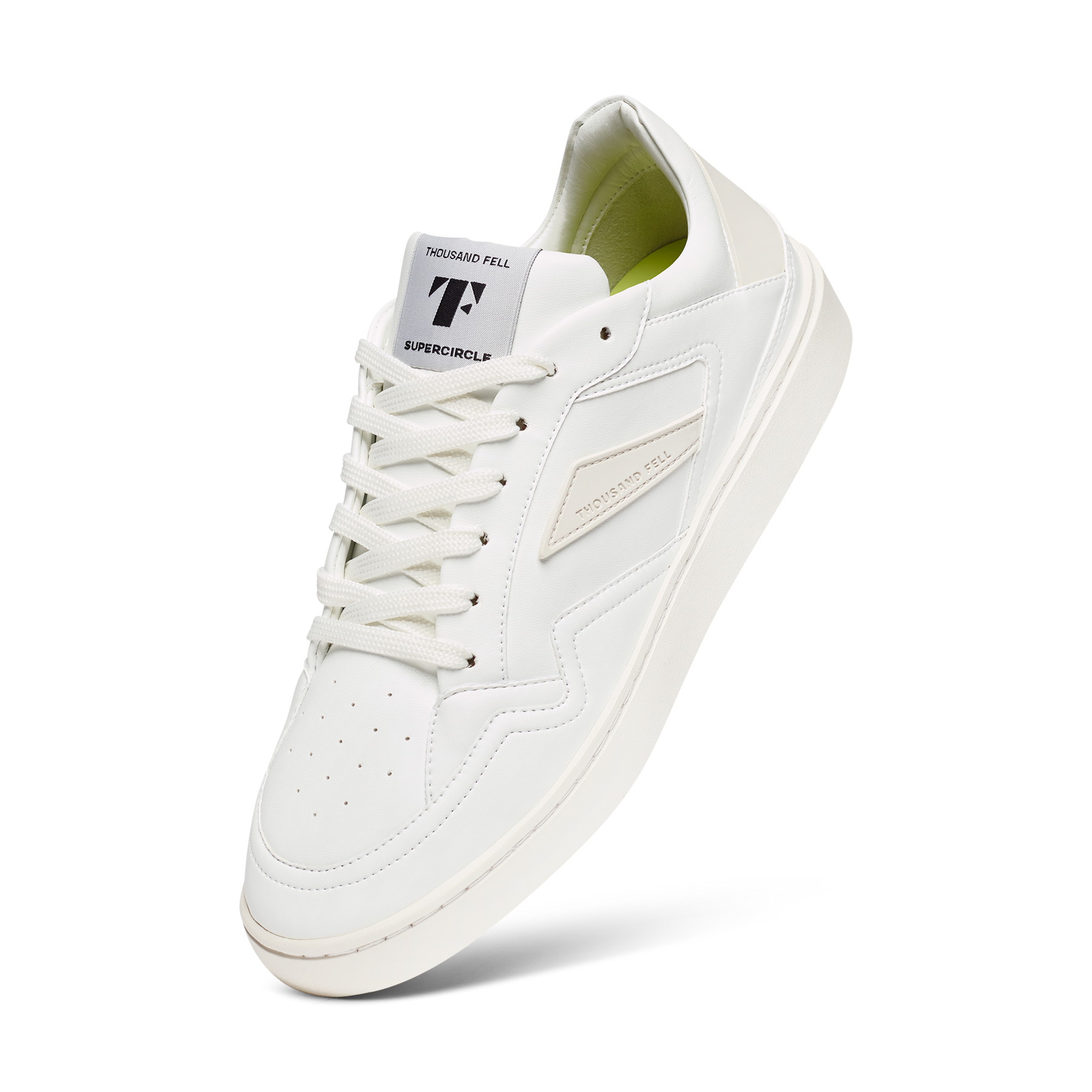 all white sustainable sneakers made from recycled materials 