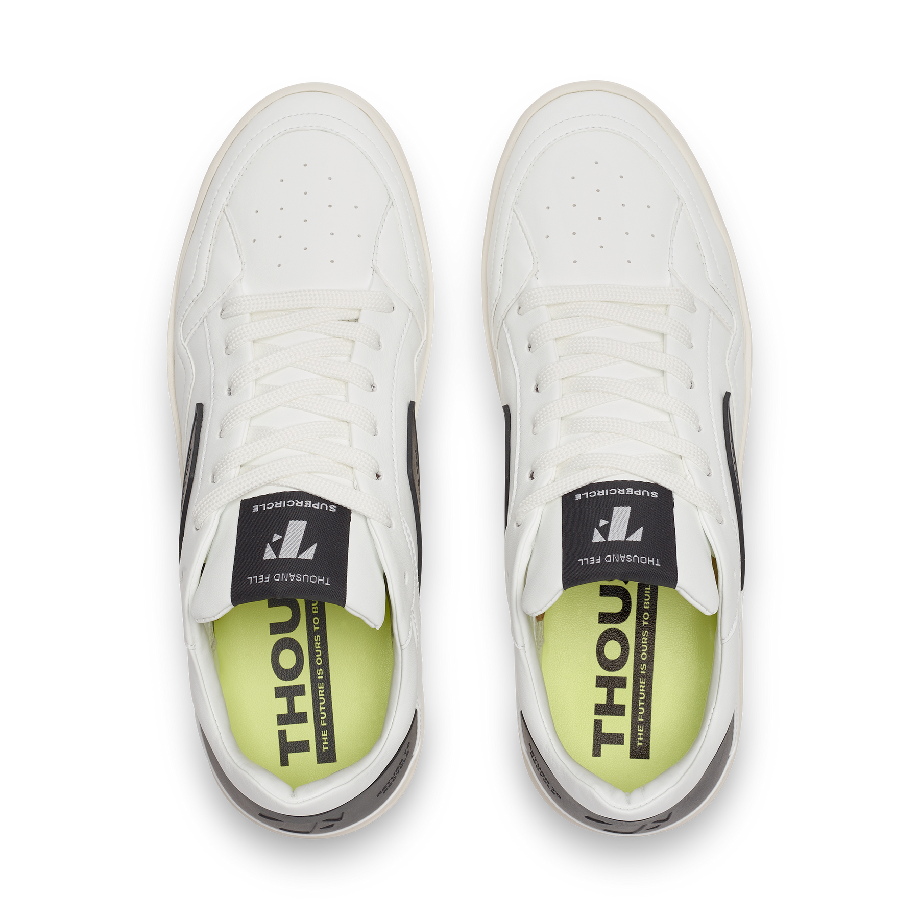 top view of white ethical alternative to nike court sneakers with black details
