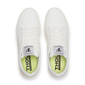 top view of all white vegan sustainable tennis shoes