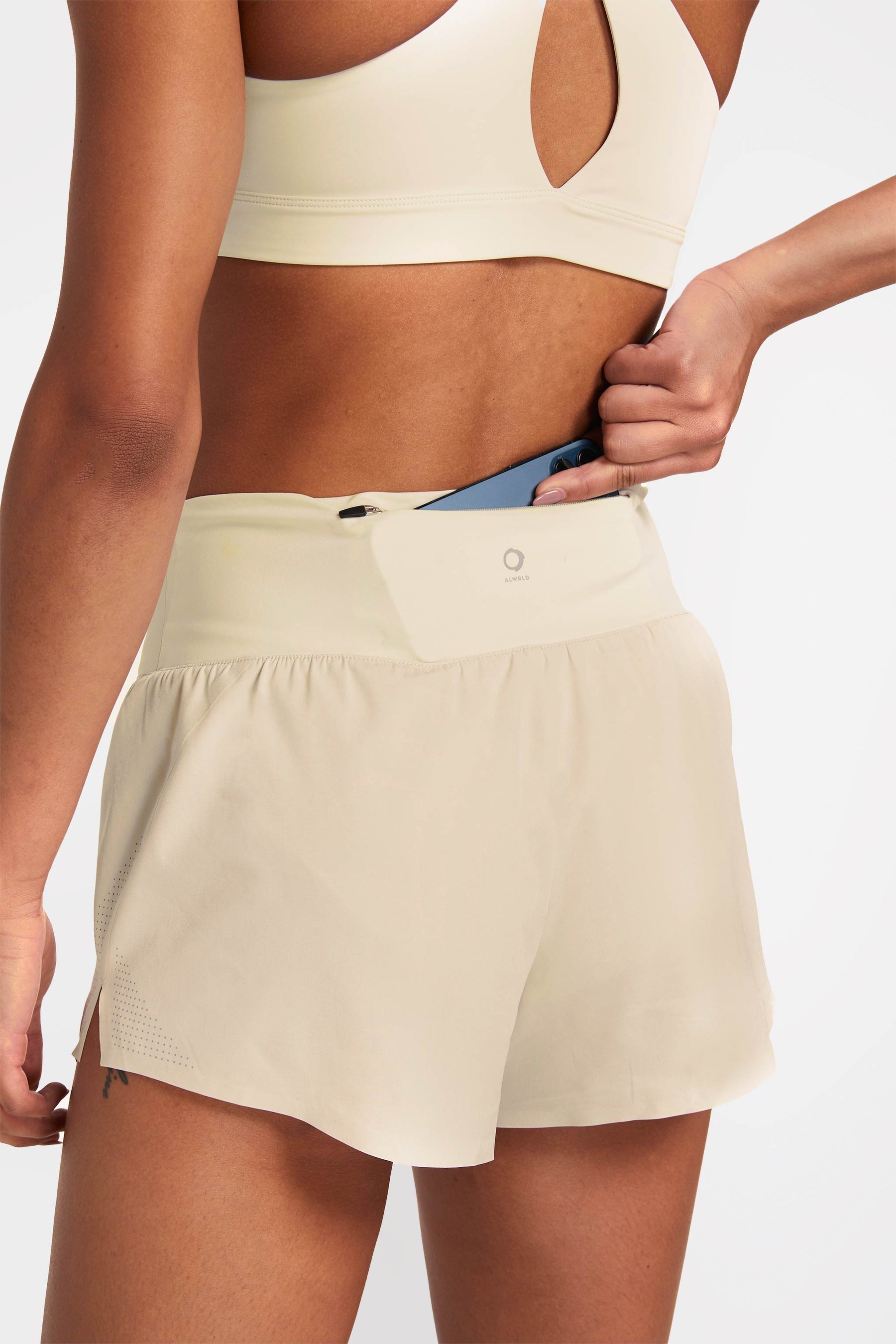 Back view of sustainable running shorts with hidden pocket