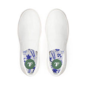 top view of classic white slip ons sustainable sneakers