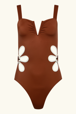 sustainable swimwear brown one piece bathing suit with white petal cutouts at waistline