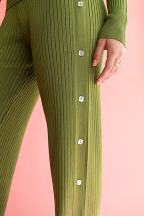 green knit pants with buttons