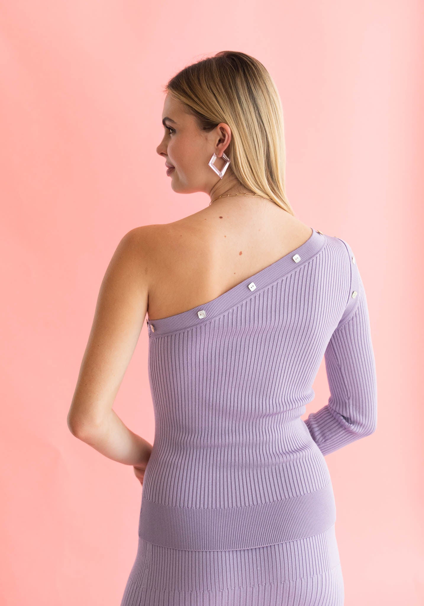 purple knit top with mother of pearl buttons