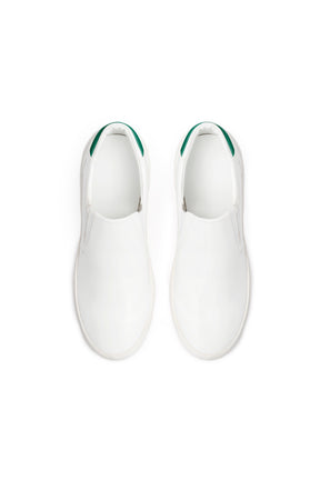 top view of white and green eco conscious sneakers