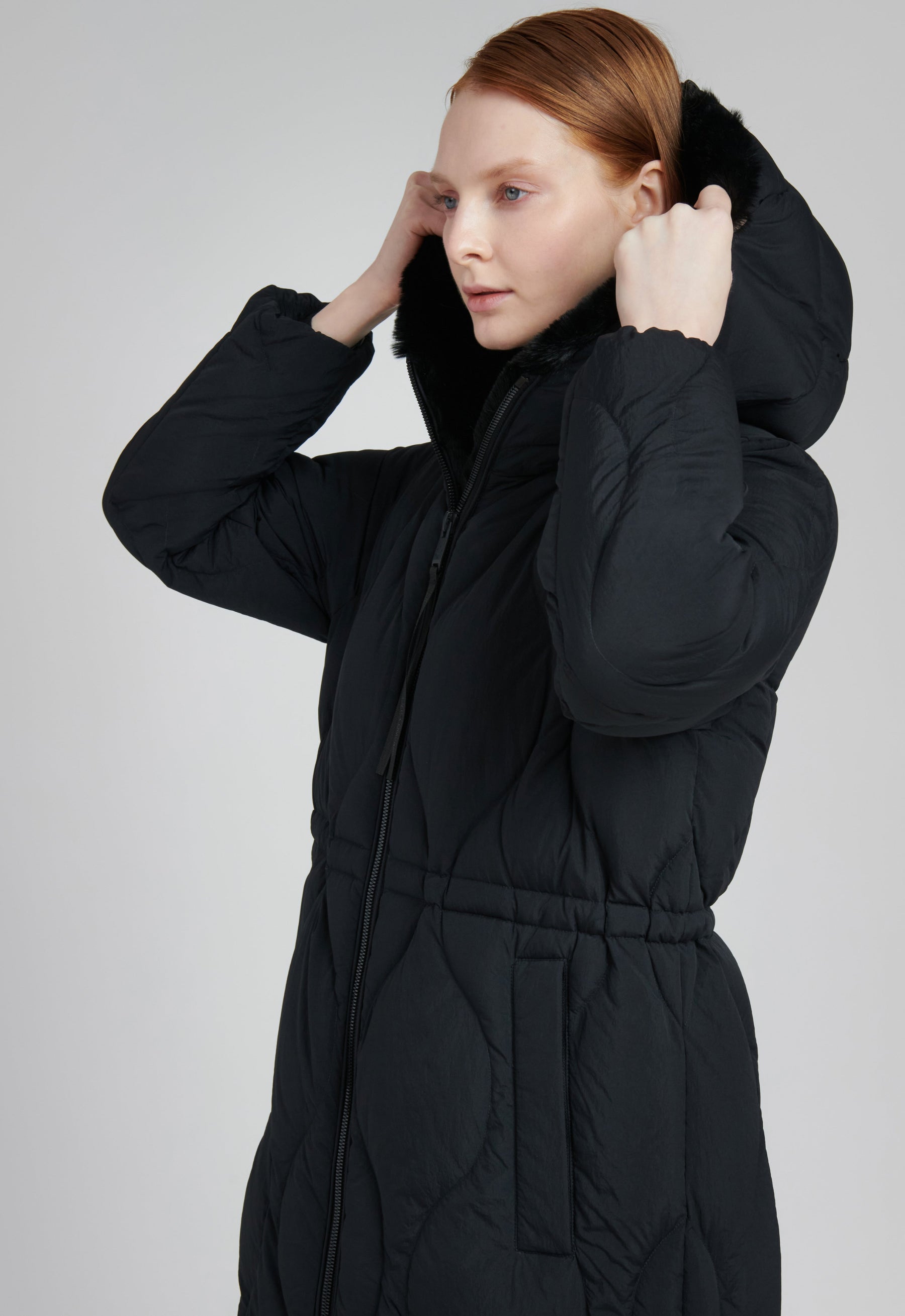 eco friendly long winter coat in black with sherpa lining