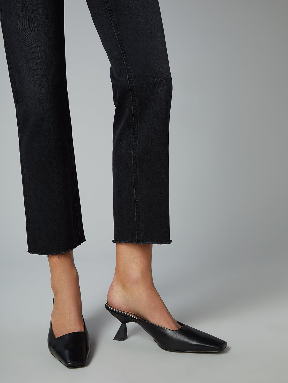 raw hem on the high rise straight leg vintage inspired black jeans