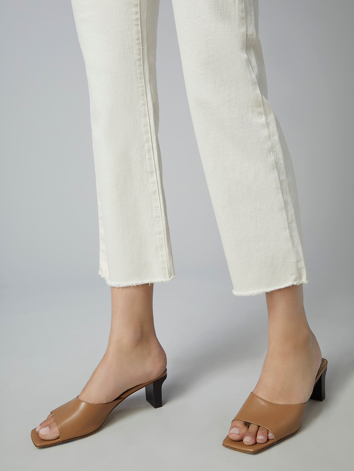 ankle cut high waisted vintage inspired sustainable jeans in ecru