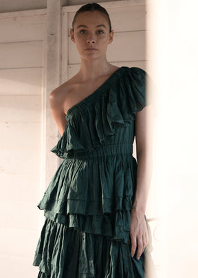 emerald green one shoulder midi dress with tiered ruffles made from organic cotton