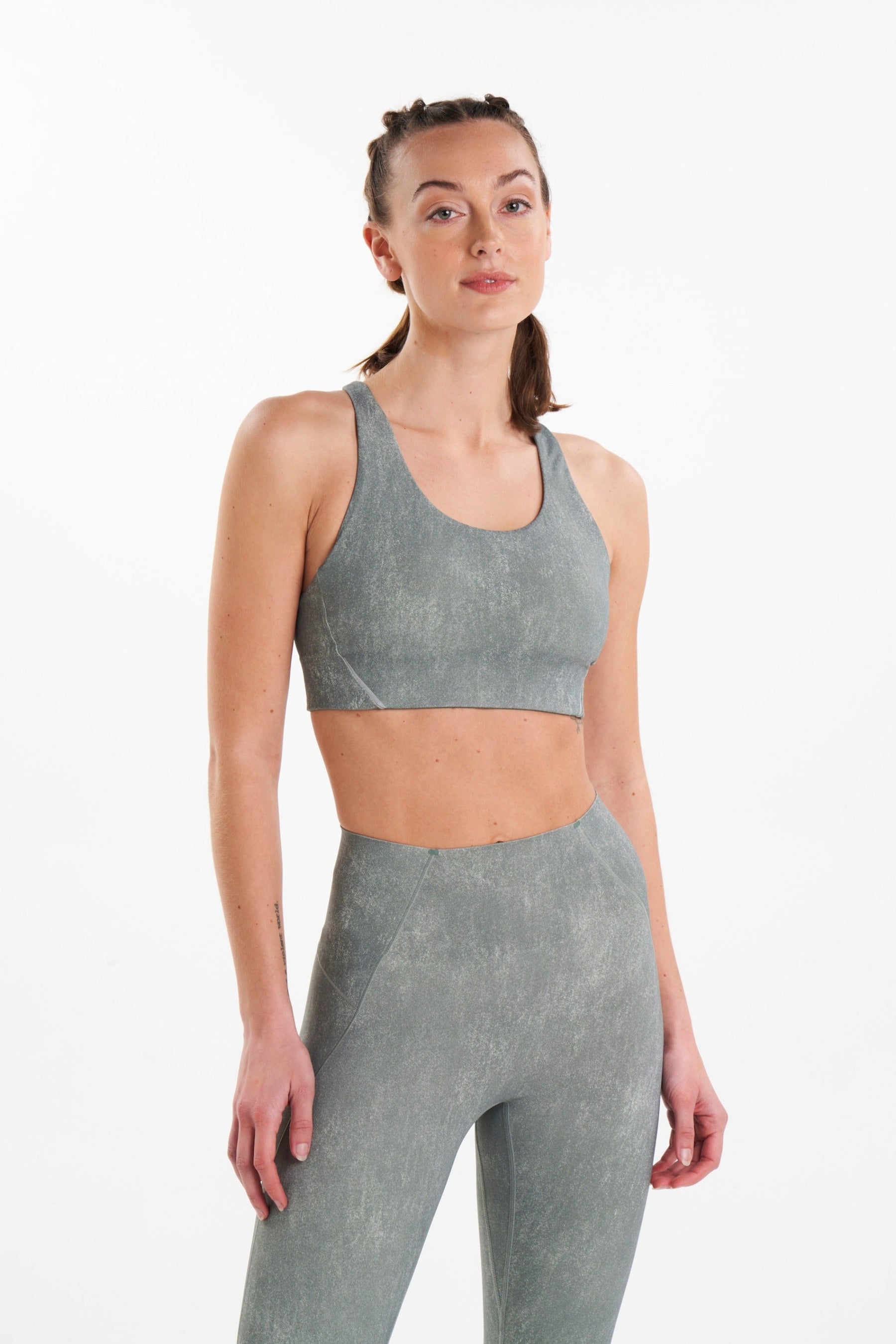 Breathable sustainable sports bra in color weathered fern (sage/grey)