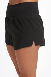 Side view of lightweight eco-friendly athletic shorts in color "lava rock" (black)