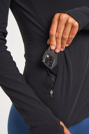 long sleeve eco-friendly workout top with zipper pockets 