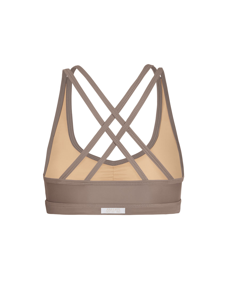 sustainable sports bra with cross back design in light brown