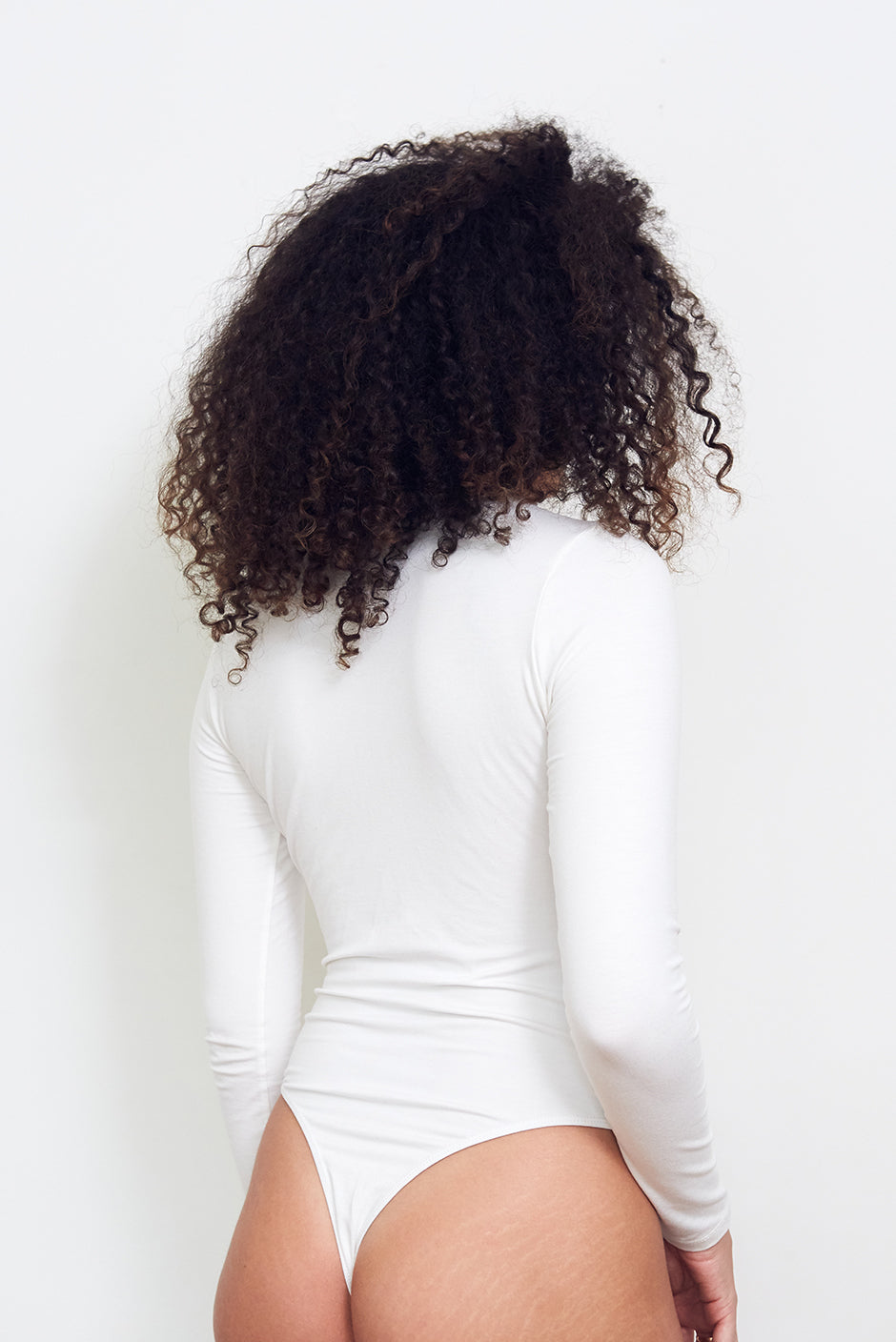 sustainable fashion white long sleeve thong bodysuit