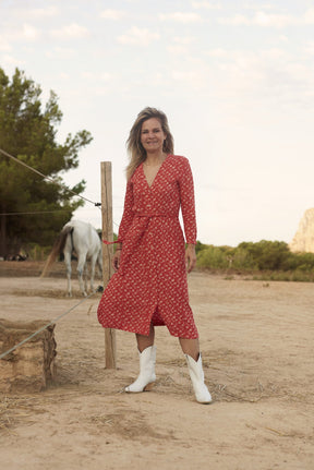 woman wearing sustainable cowboy boots made with vegan leather