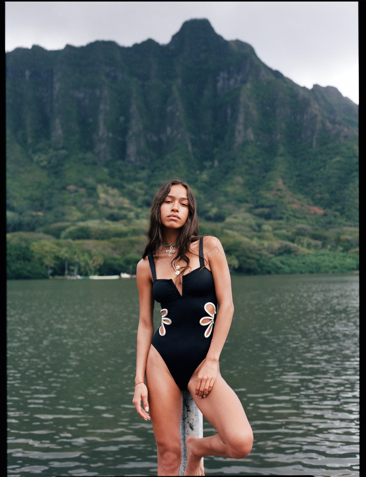 slow fashion brand black one piece swimsuit with cutouts