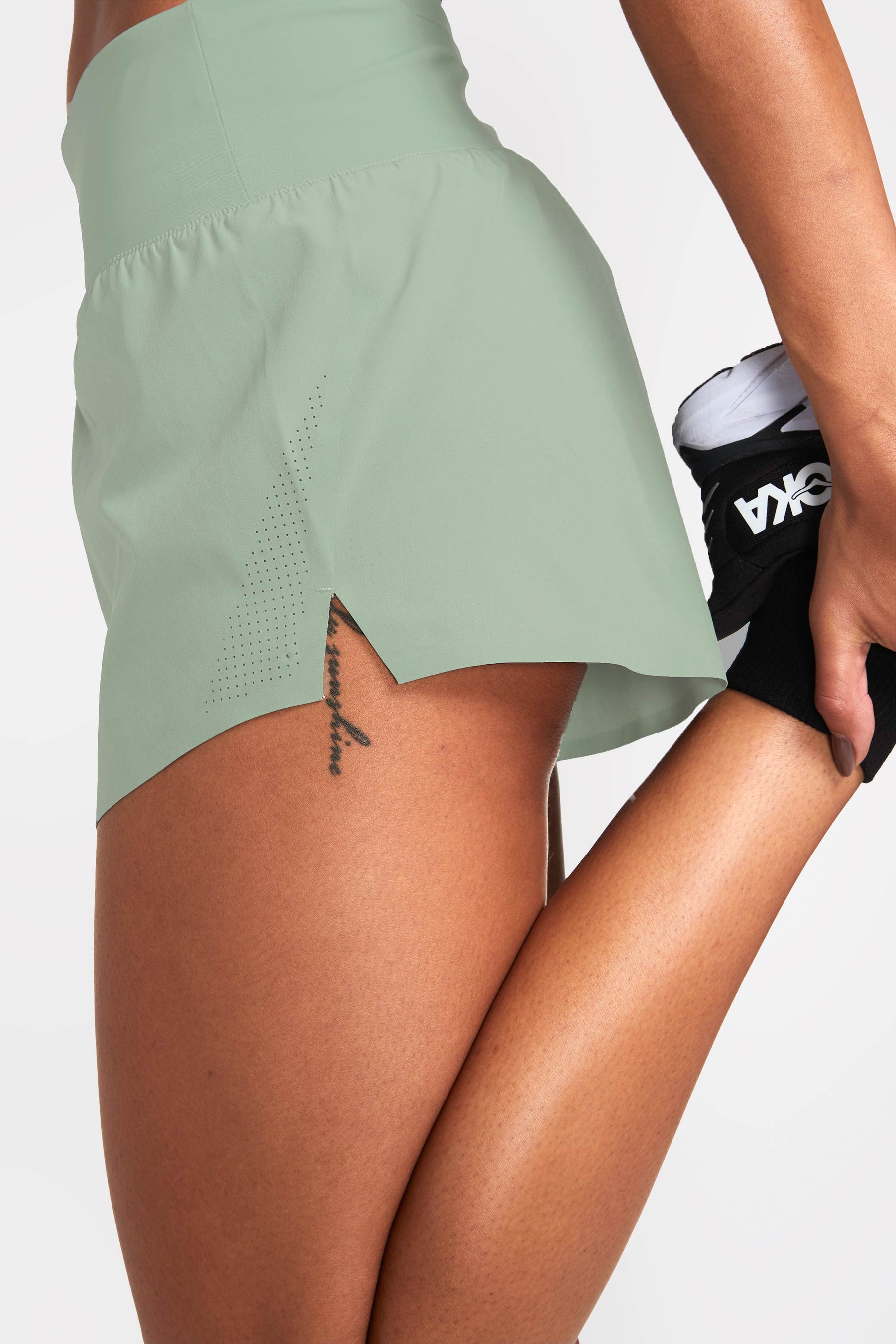 Side view of athletic workout shorts in glacier color