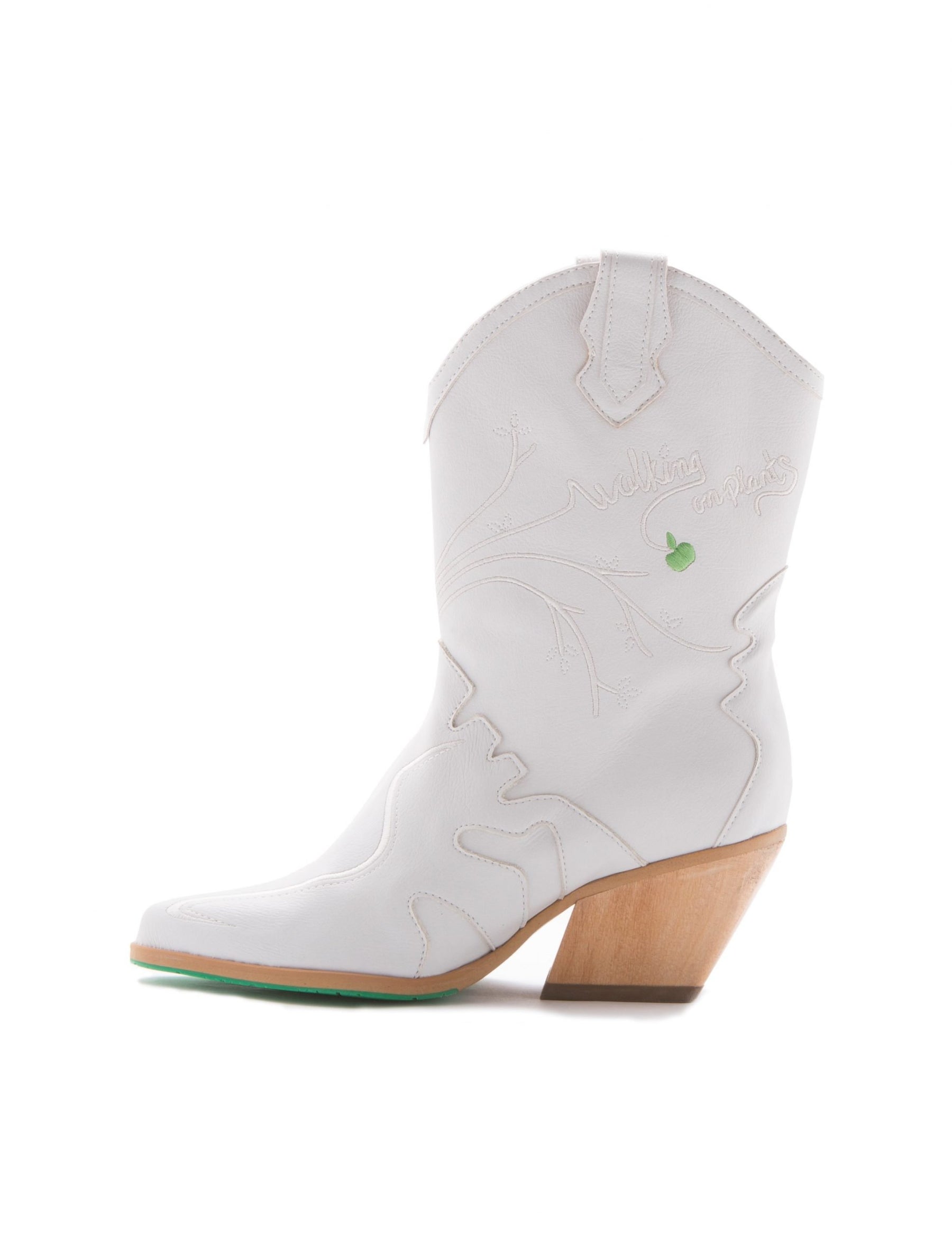 side view white vegan leather cowboy boots with green apple detail